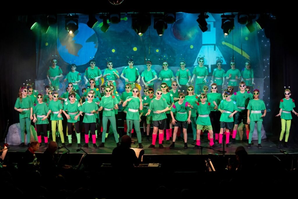 Harpenden Gang Show younger cast dressed as aliens